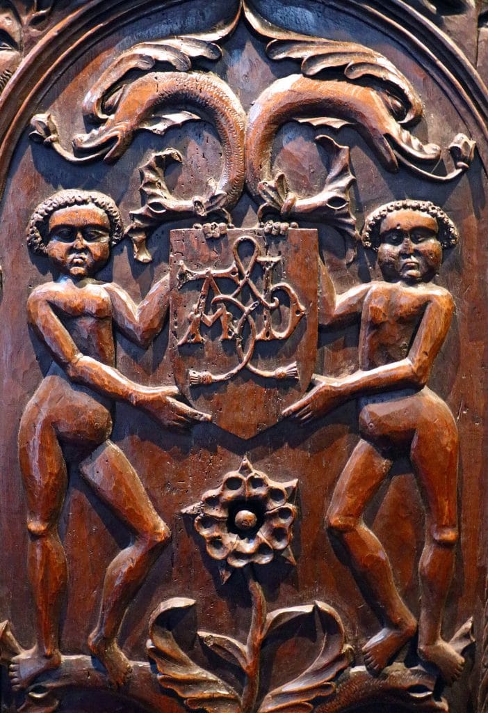 A close up photograph of carvings in a wooden chair believed to be owned by Anne Boleyn