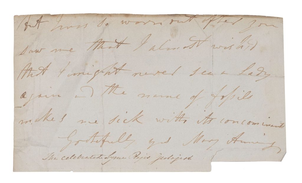 Handwritten historical letter on aged paper with cursive script, creases, and slightly torn lower edge.