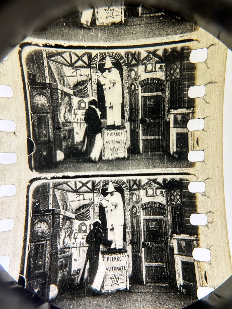 a close up of two frames from a black and white film