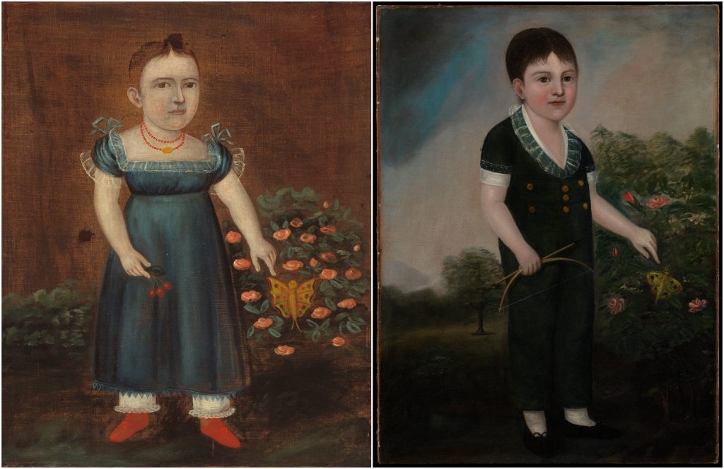 Two side-by-side early American folk portraits by Joshua Johnson of children against dark, muted backgrounds. On the left, a young girl stands facing forward in a blue empire-waist dress with short puffed sleeves, red shoes, and a coral bead necklace. She holds a small sprig with red berries in one hand and gestures toward a large yellow butterfly hovering among pink roses beside her. On the right, a young boy stands outdoors in a dark green outfit with a wide white collar and brass buttons. He holds a small bow and points toward a yellow butterfly resting on a flowering bush, with a softly painted landscape and trees in the background.