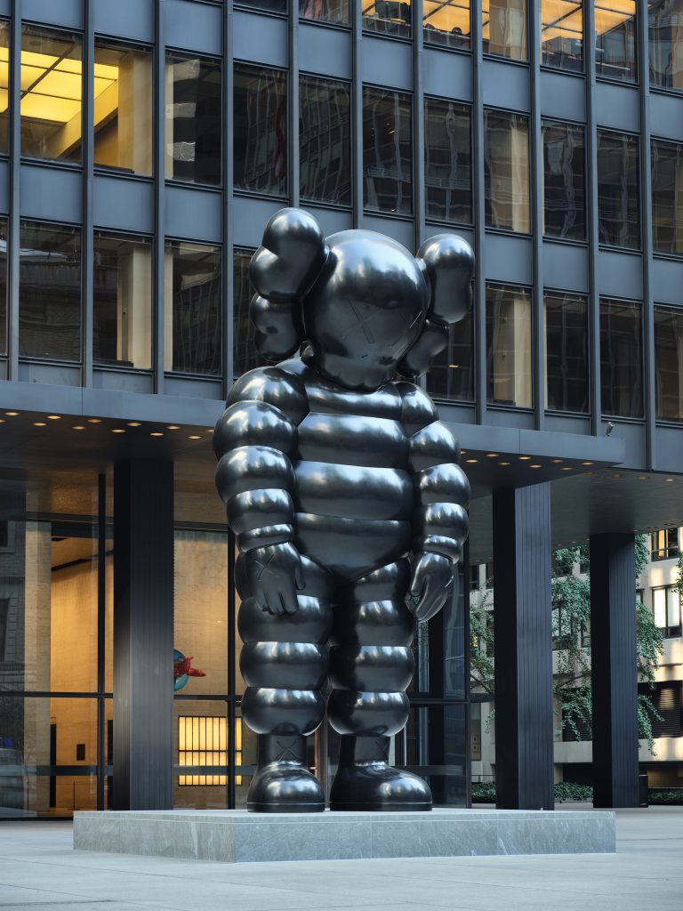 an image of a giant KAWS figure outside Seagram plaza