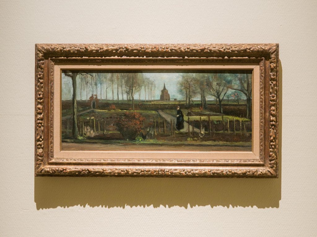 a painting on a wall with heavy shadow under it