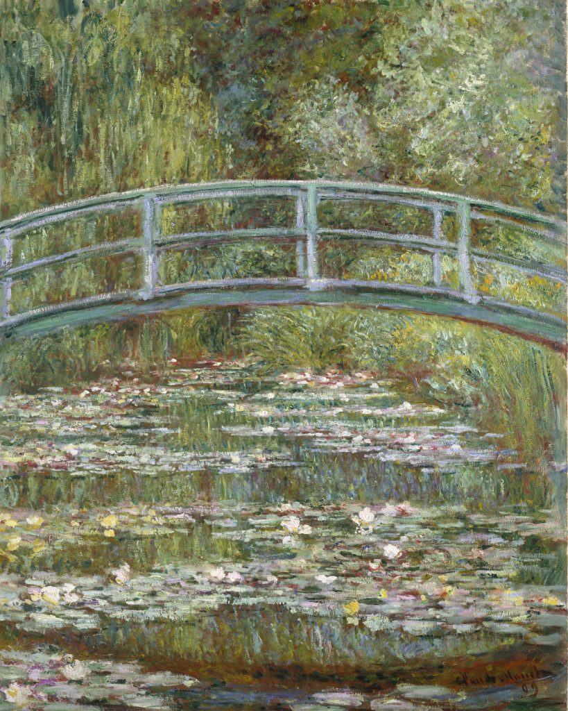 A Claude Monet painting of a pale green arched wooden bridge spanning a lily-covered pond, rendered in loose impressionist brushstrokes with layered greens, blues, and soft whites, surrounded by dense foliage and reflected in the water below.