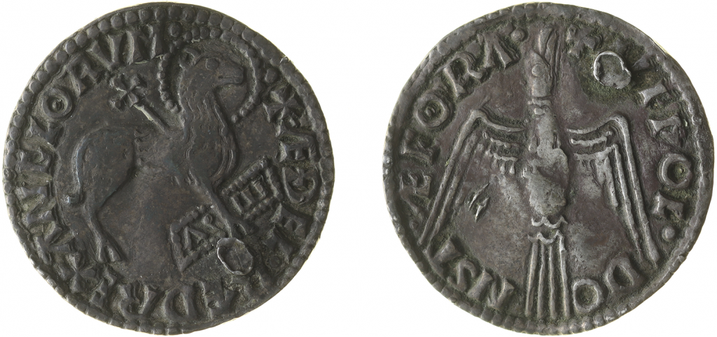 two sides of a coin on a white background